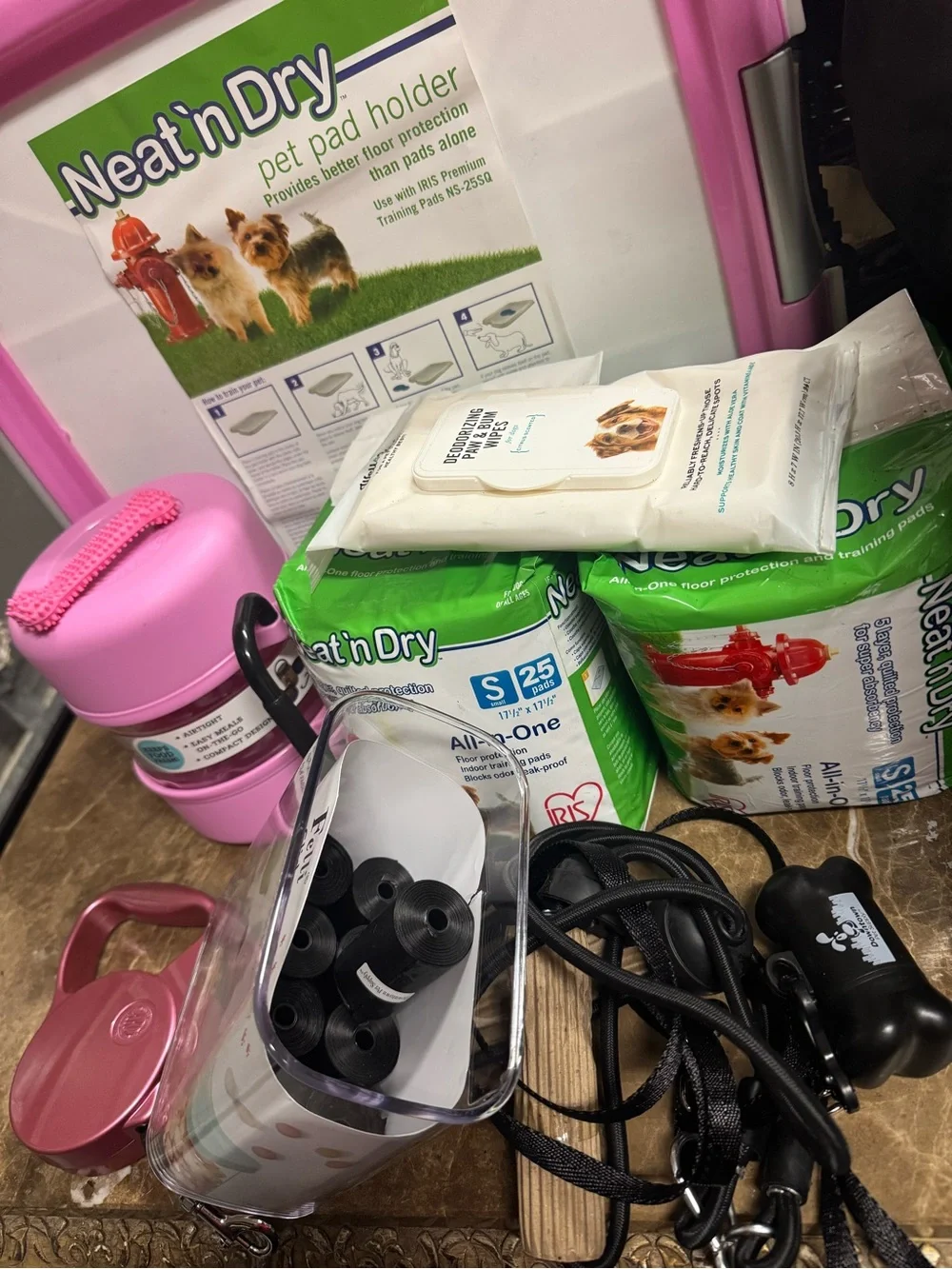 Lot of Pet accessories:Pad Holder,Leash,waste bags,retractabl leash,food storage